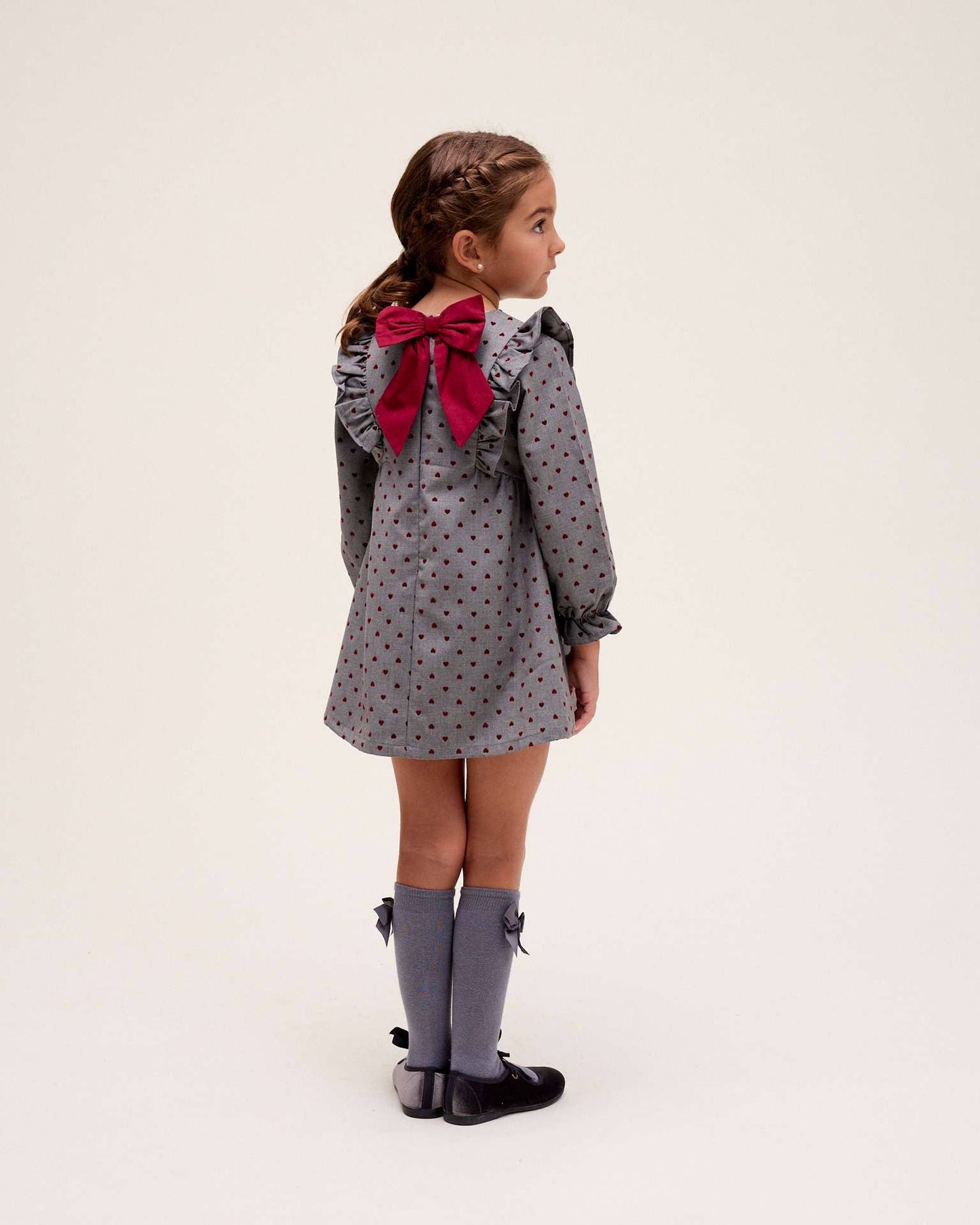 Vestito grigio con cuoricini in velluto