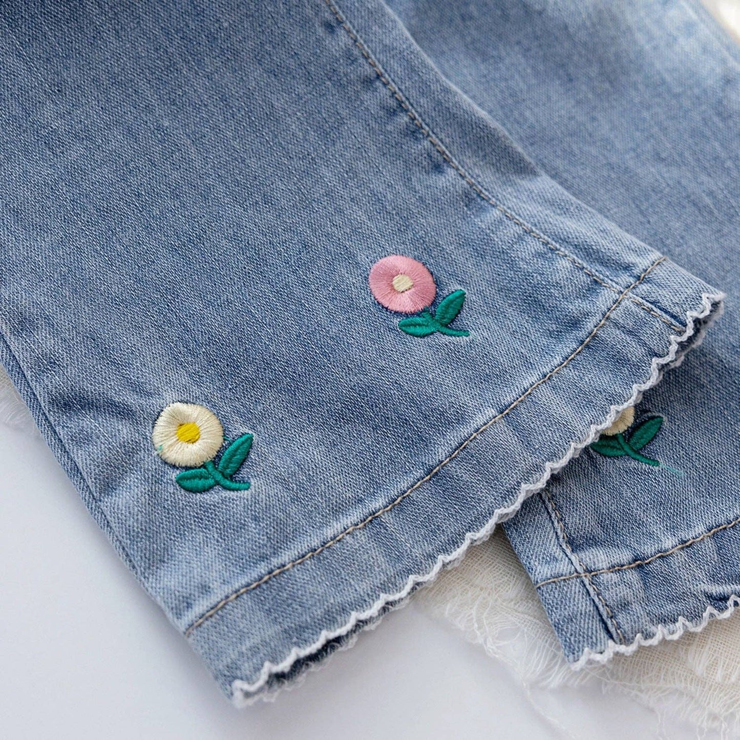 Jeans svasati ricamati con fiori per bambine 9M-6Y