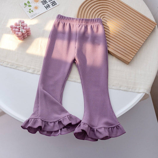 pantaloni svasati a balze tinta unita