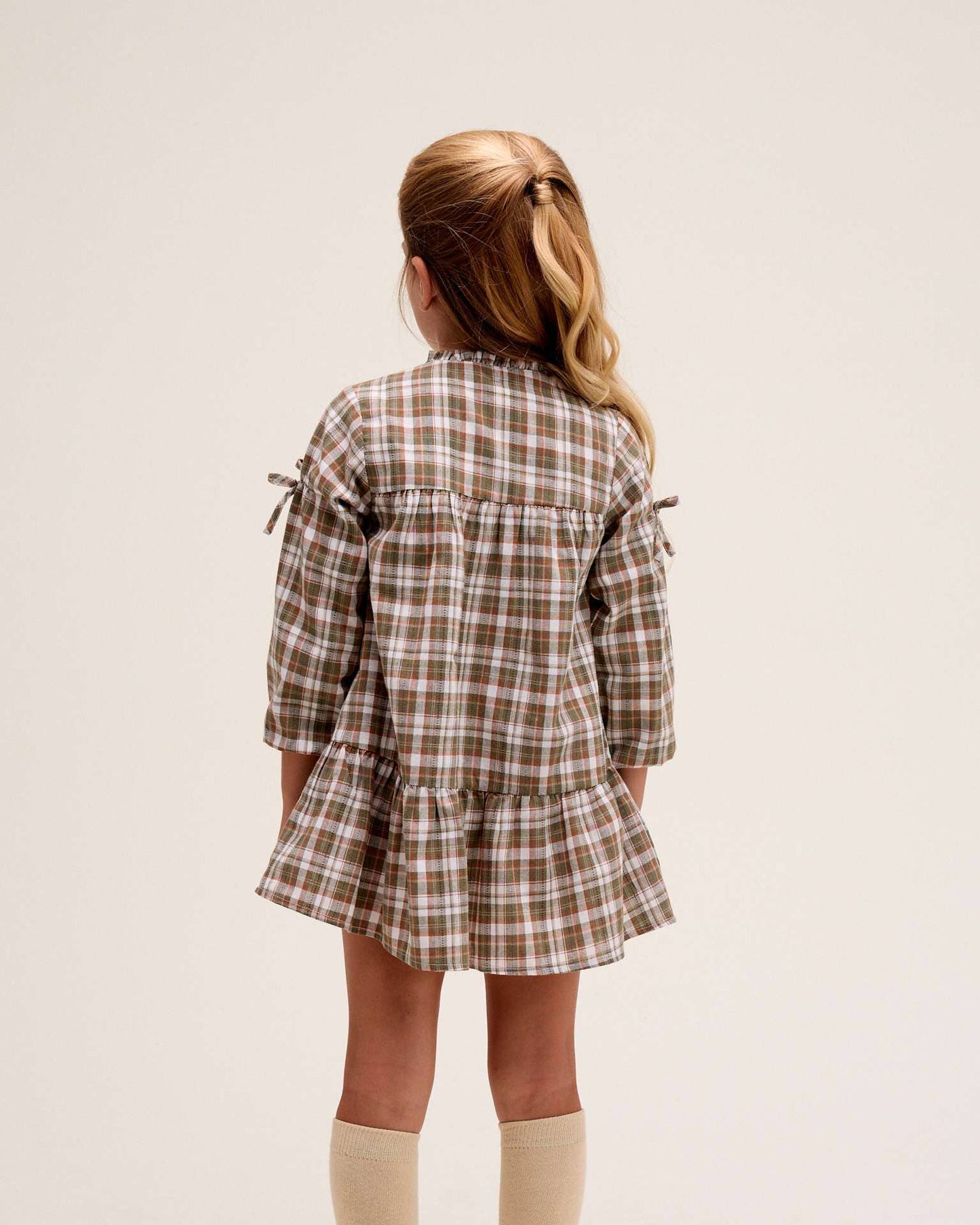 Vestito a quadri marroni e verdi